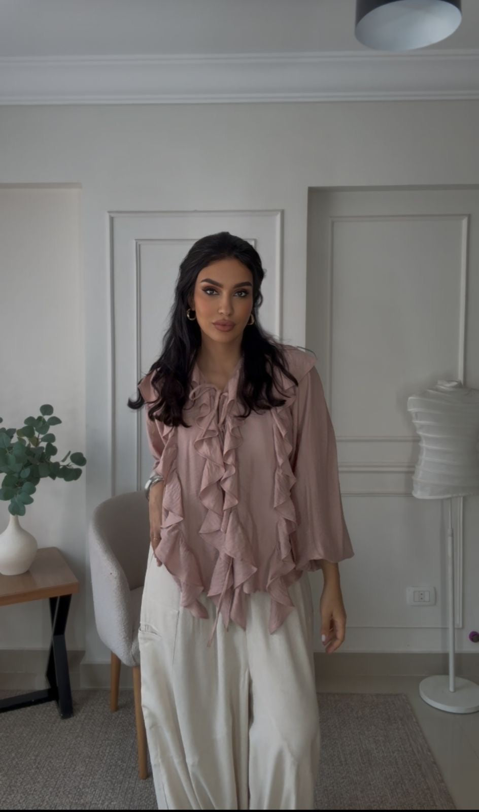 Powder pink ruffled blouse