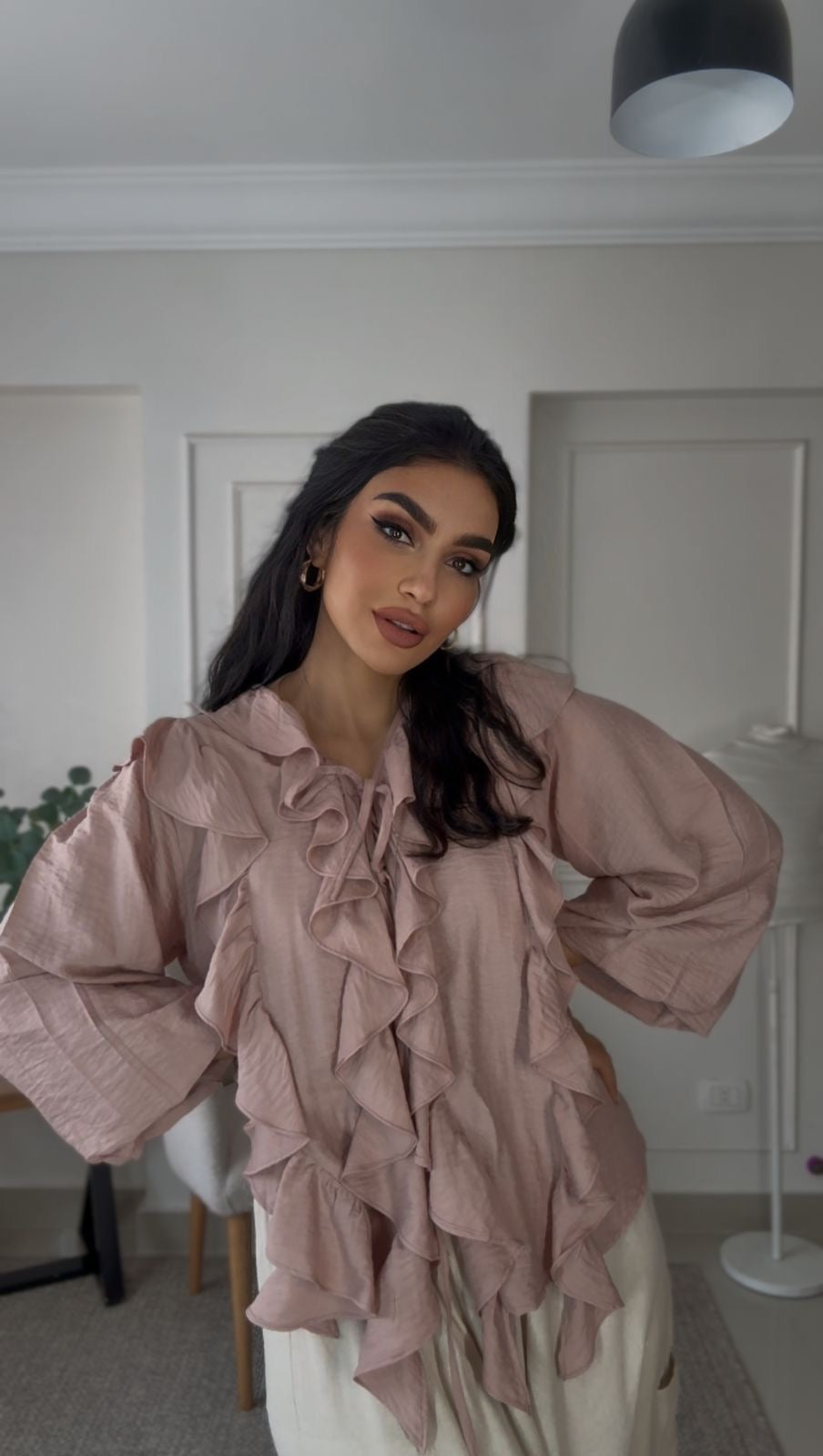 Powder pink ruffled blouse