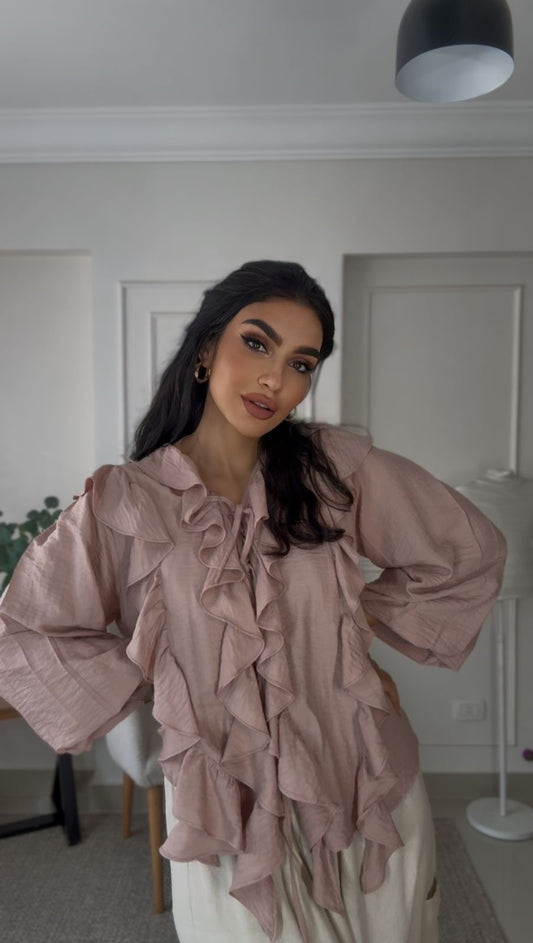 Powder pink ruffled blouse