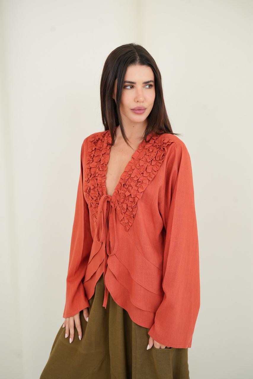 Orange ruffled muse blouse