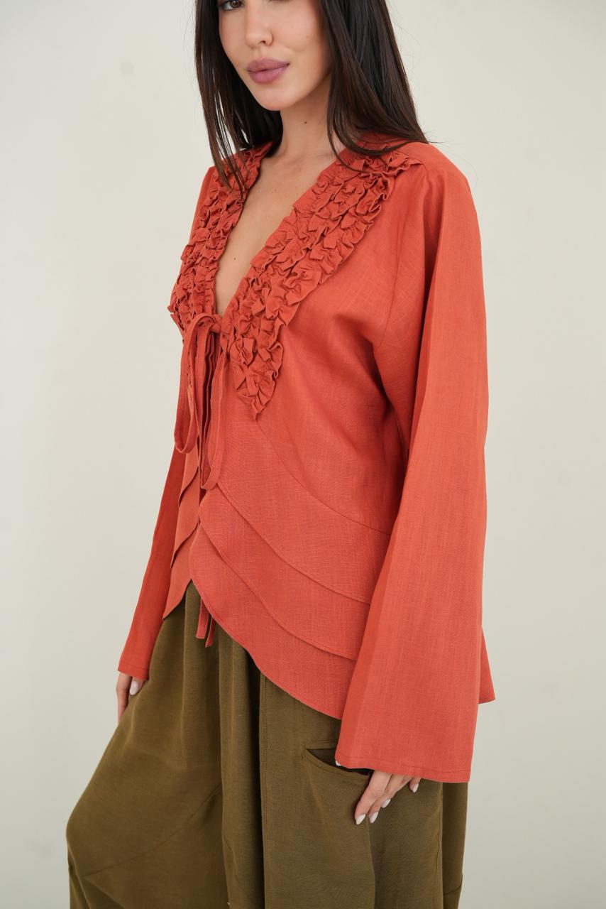 Orange ruffled muse blouse