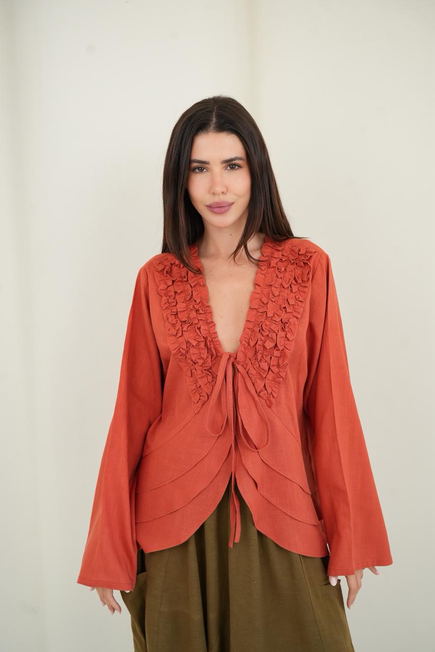 Orange ruffled muse blouse