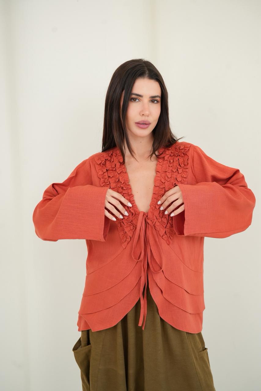 Orange ruffled muse blouse