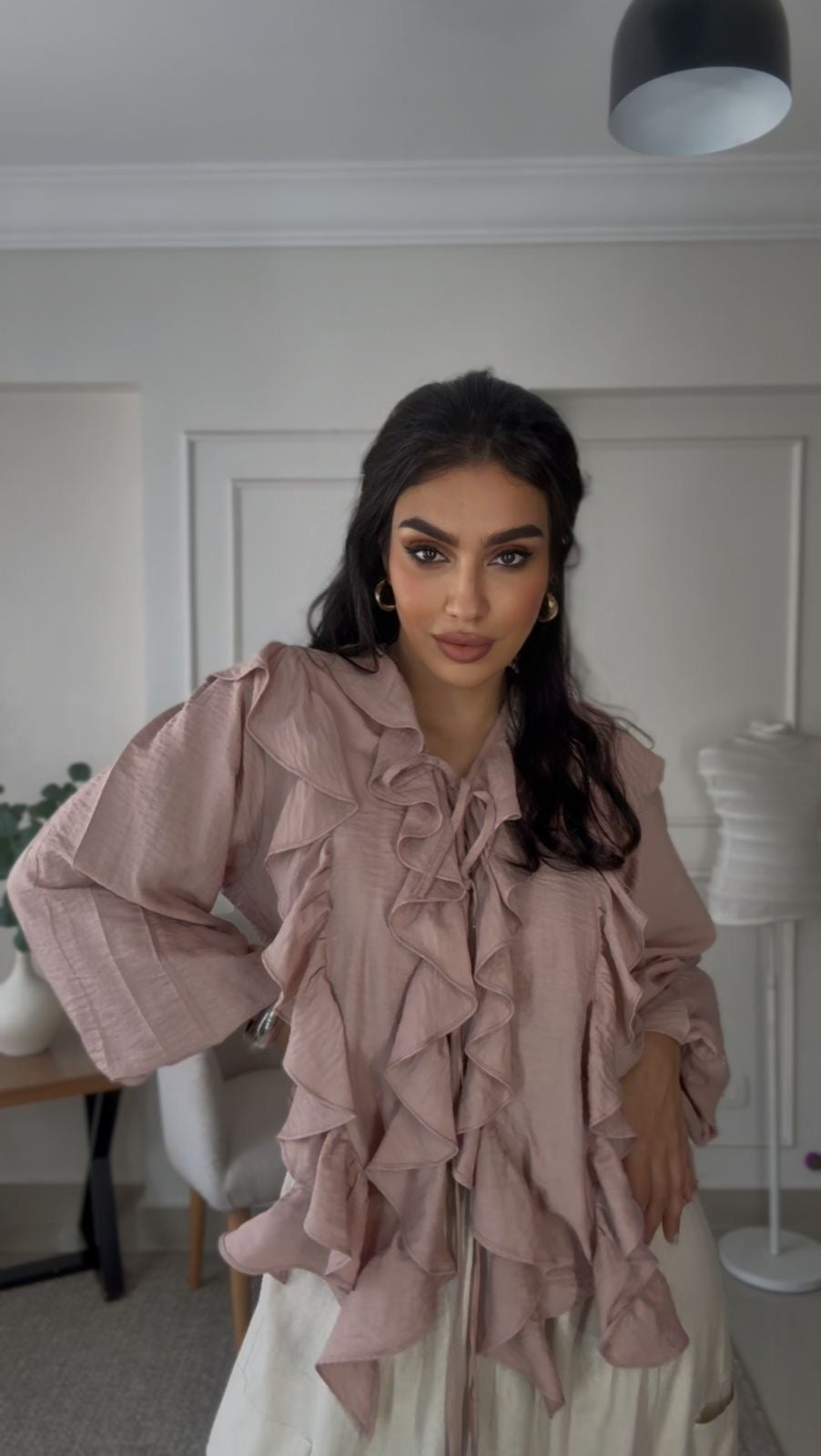 Powder pink ruffled blouse